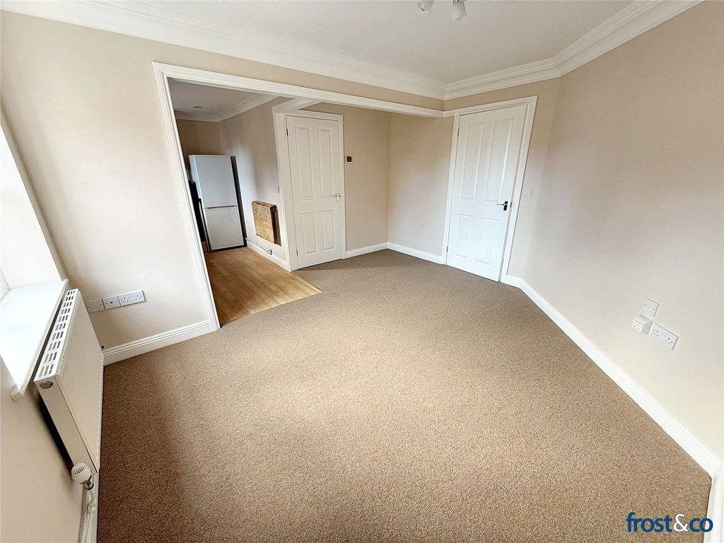 Property photo 3 of 11 Living Area