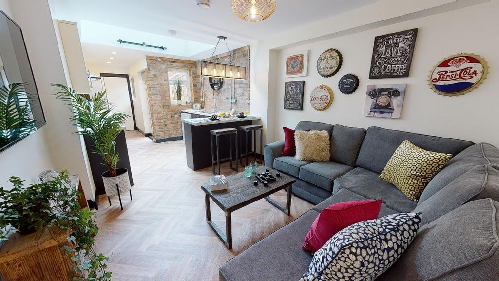 Property photo 1 of 7 A Spacious, Well-Lit Living Room With Contemporary...