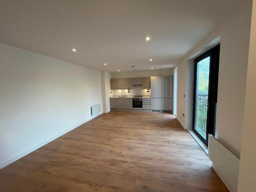 Property photo 2 of 6 Kitchen/Living Area