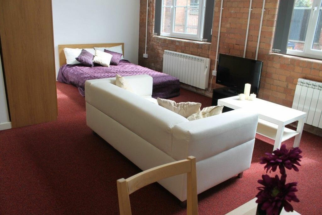 Property photo 1 of 3 A Stylish Double Bedroom Featuring A Cozy Bed Ador...