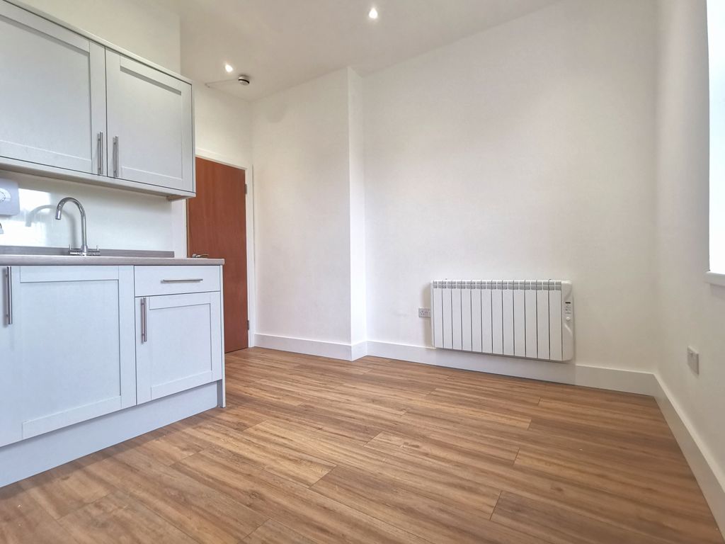 Property photo 2 of 9 Living Area