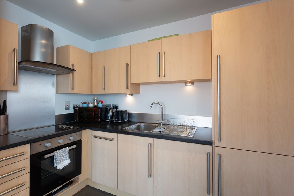 Property photo 3 of 9 Kitchen