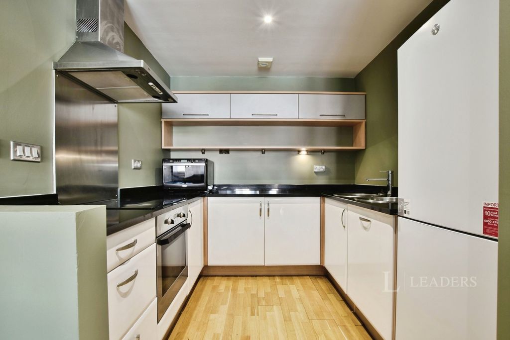 Property photo 3 of 12 Kitchen