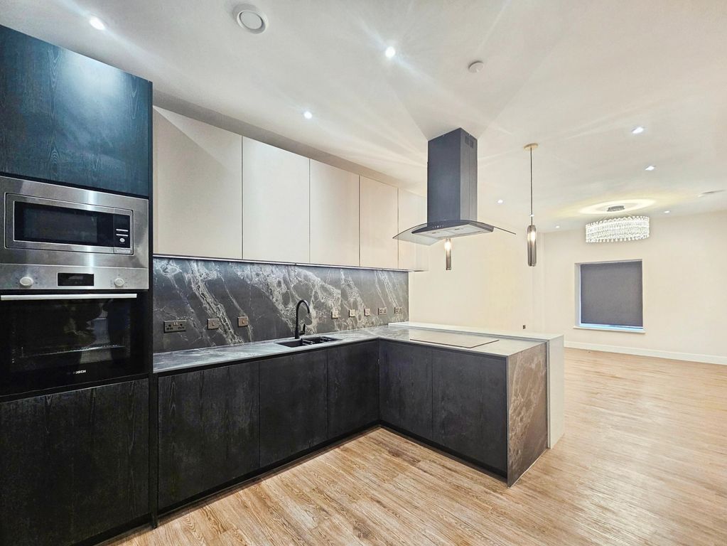 Property photo 2 of 13 Kitchen Living