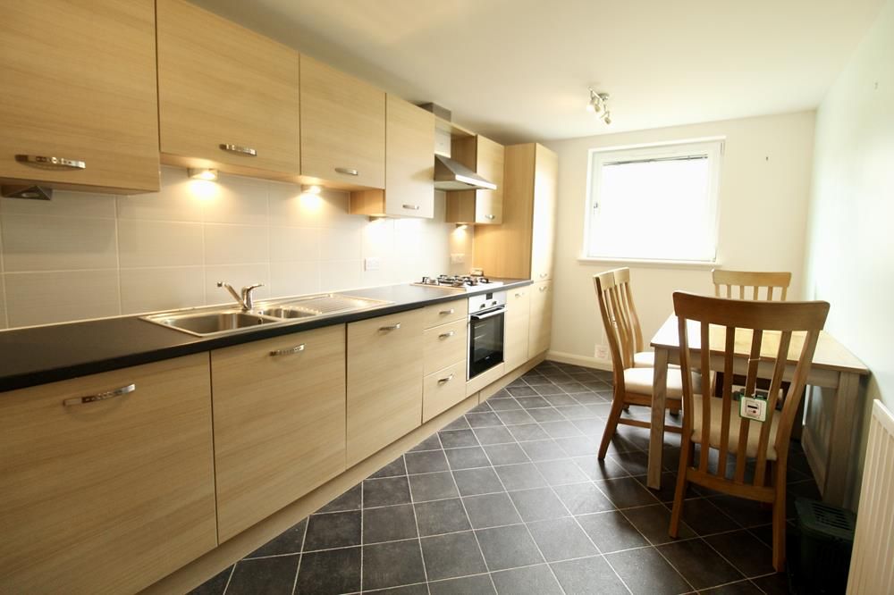 Property photo 3 of 8 Dining Kitchen