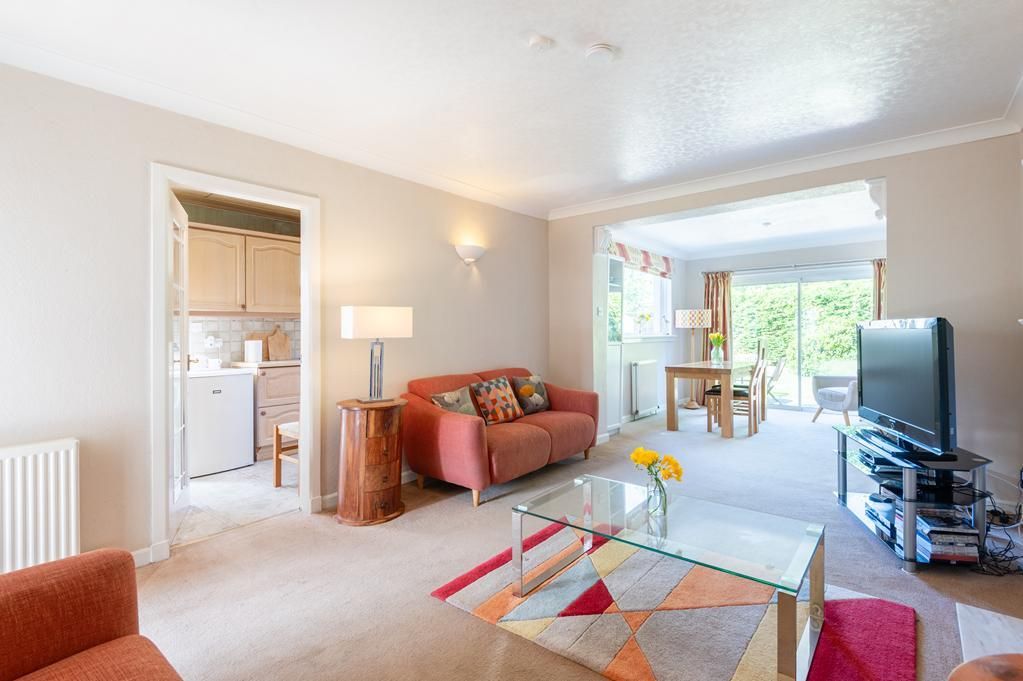 Property photo 3 of 22 Cup1388Seg Living Room To Kitchen.Jpg