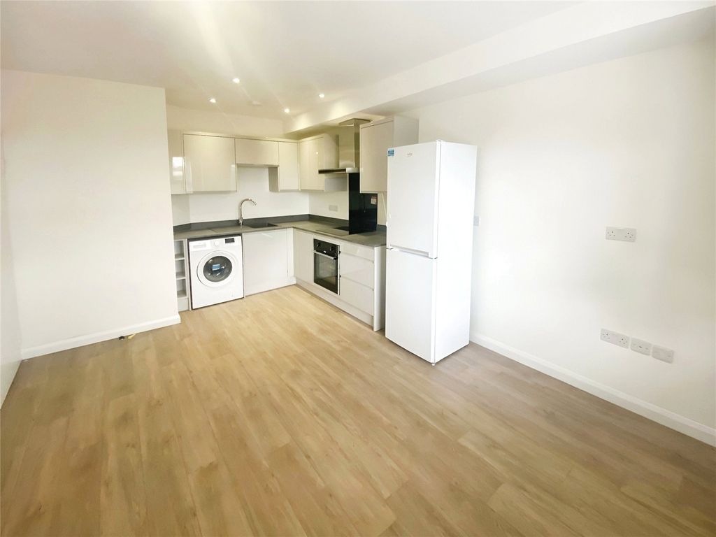 Property photo 2 of 6 Kitchen/Living Area