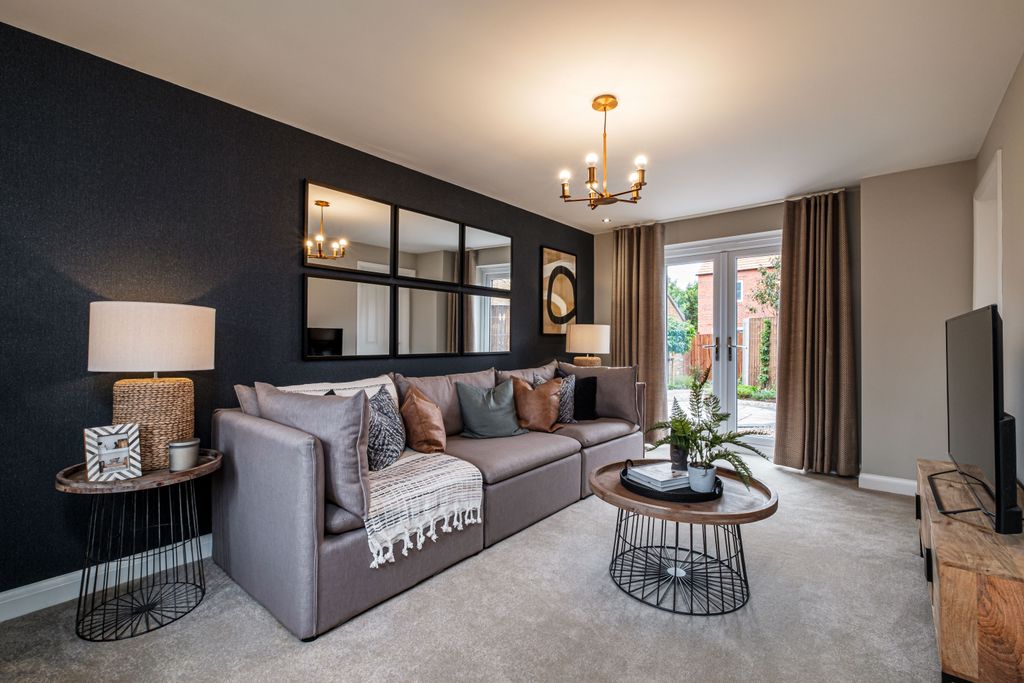 Property photo 3 of 9 Lounge With Dark Blue Wall And French Doors To The Garden