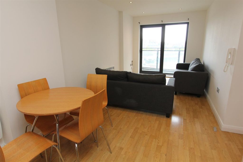Property photo 1 of 9 Bright Lounge With A Dining Area And Balcony....