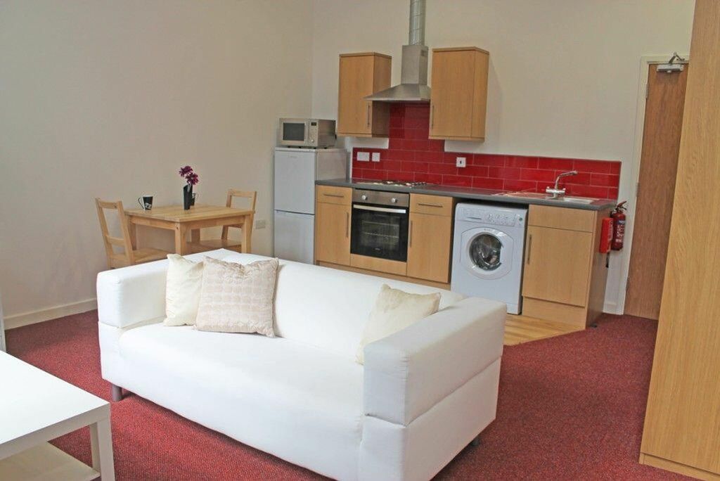 Property photo 3 of 3 This Inviting Kitchen Features Modern Appliances, ...