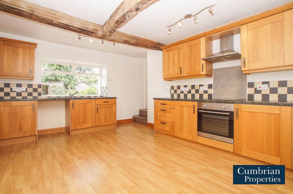 Property photo 2 of 26 Dining Kitchen