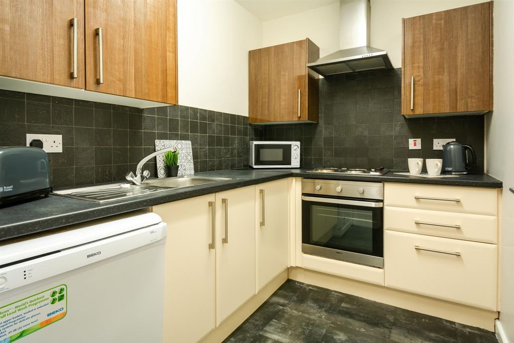 Property photo 3 of 7 Modern Fitted Kitchen With Sleek Appliances...