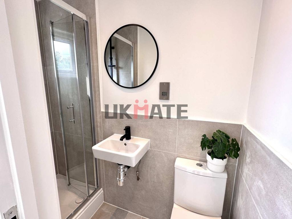 Property photo 2 of 5 Modern Bathroom With A Compact Shower Cubicle, A S...