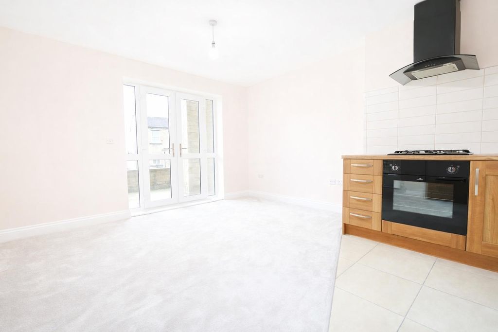 Property photo 2 of 9 Bright Modern Living Space With Kitchen.Png