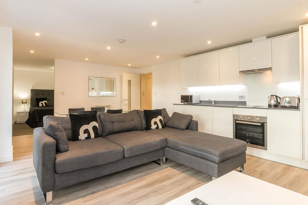 Property photo 1 of 9 Living Area