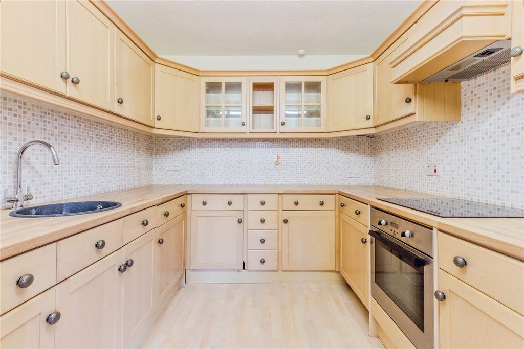 Property photo 3 of 12 Kitchen