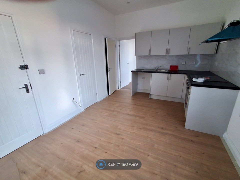 Property photo 1 of 7 Kitchen/Living Area