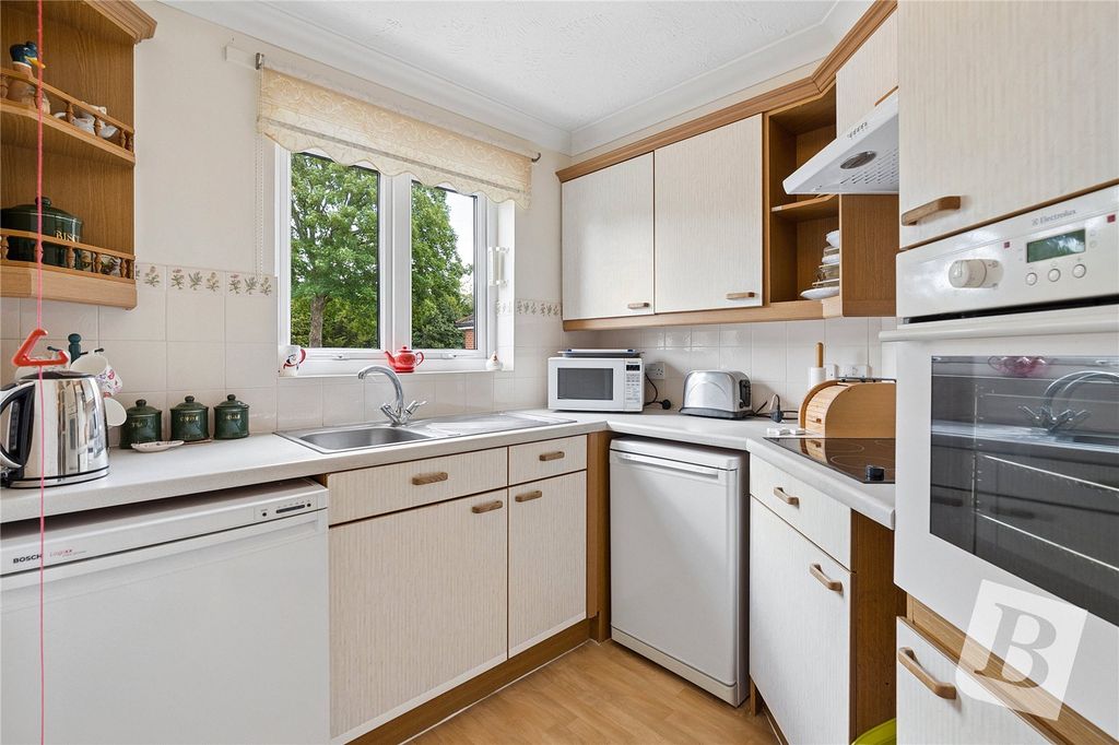 Property photo 3 of 8 Kitchen