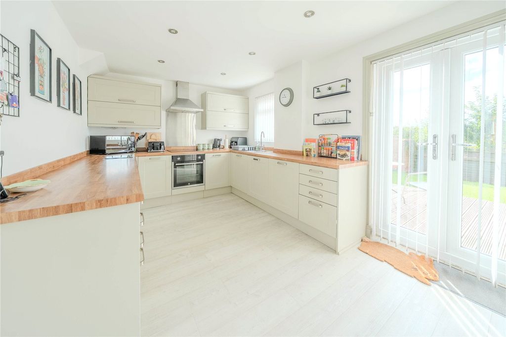 Property photo 3 of 13 Dining Kitchen