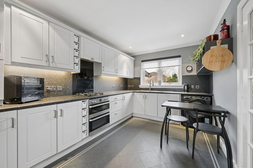 Property photo 2 of 32 Kitchen Area