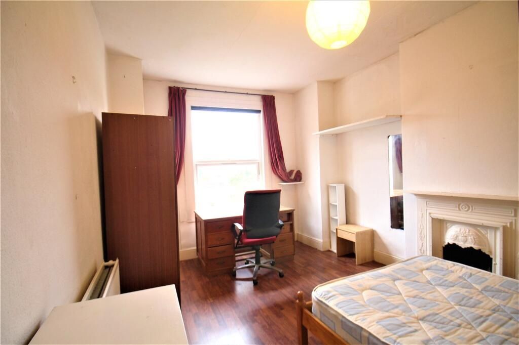 Property photo 2 of 16 Bright And Spacious Master Bedroom Featuring A Lar...