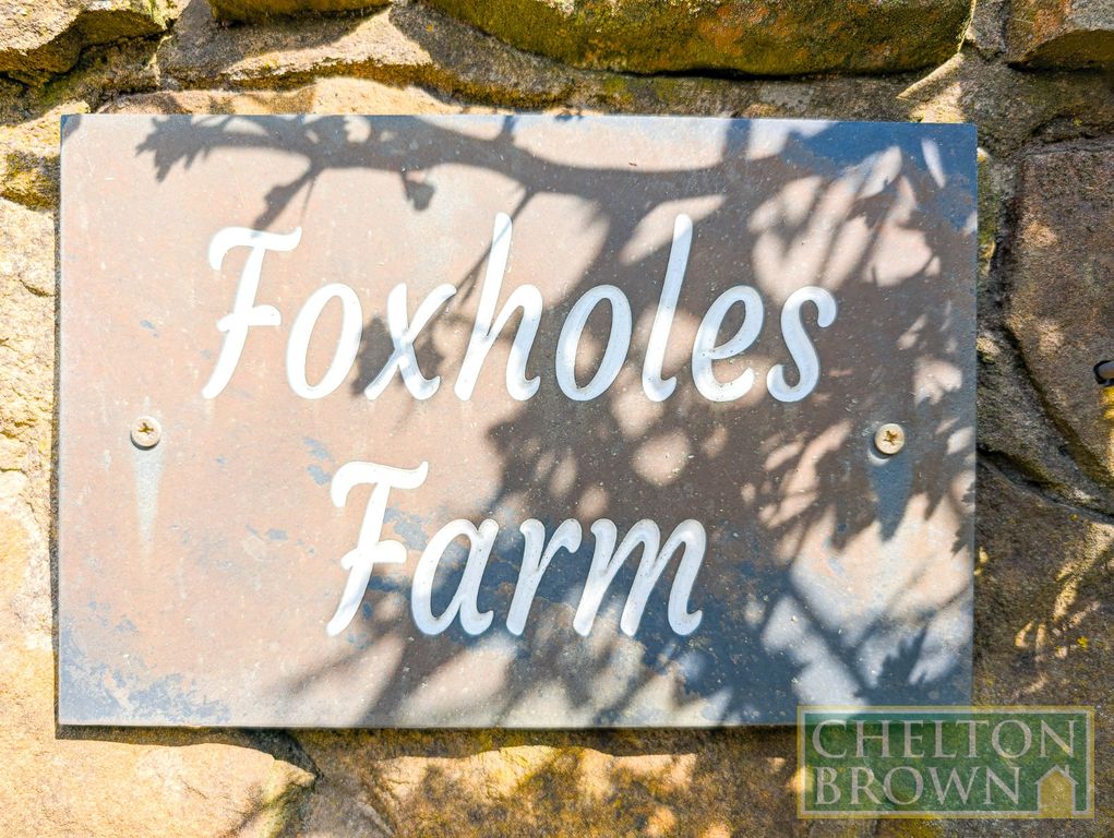 Property photo 2 of 63 Gate Sign