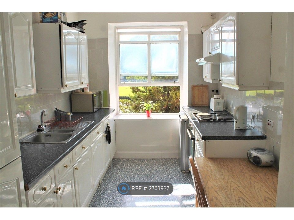 Property photo 3 of 12 Upper Kitchen