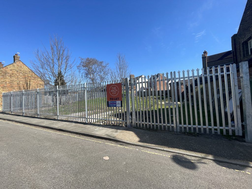 Property photo 1 of 2 An Open Yard With Metal Fencing Around It.