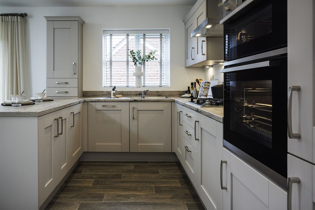 Property photo 3 of 10 Kitchen Area