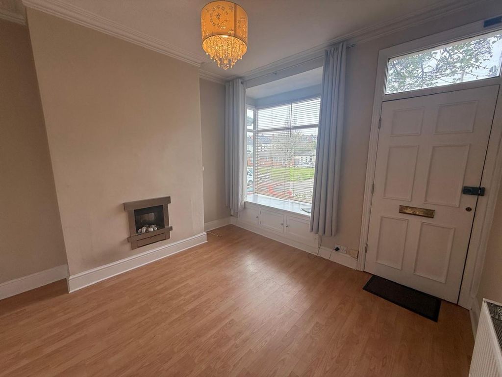 Property photo 2 of 12 Front Lounge