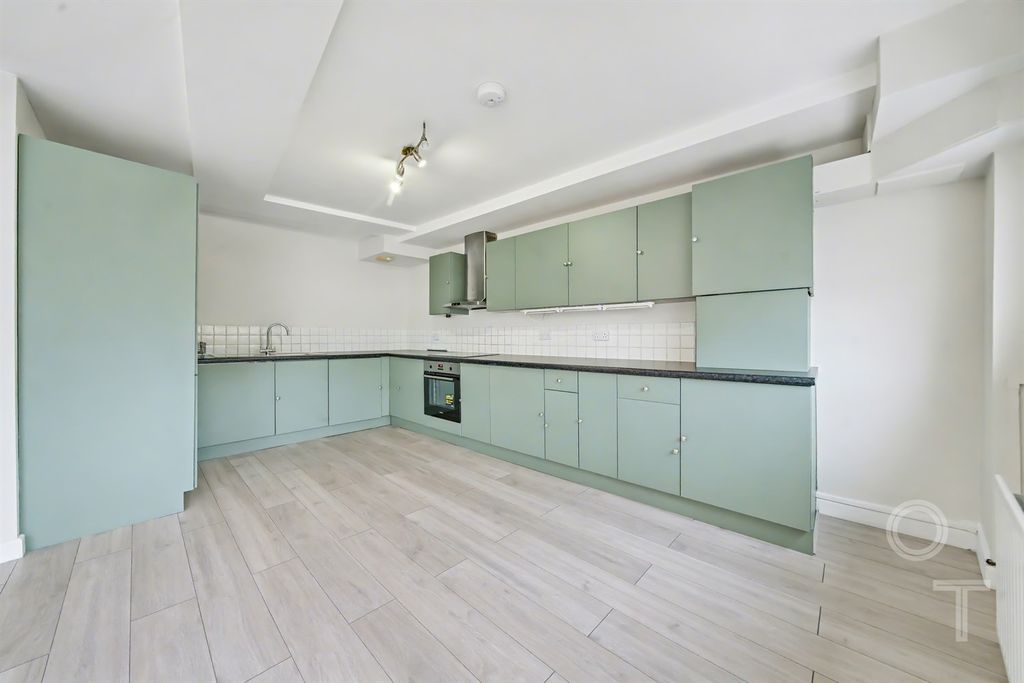 Property photo 3 of 12 Kitchen