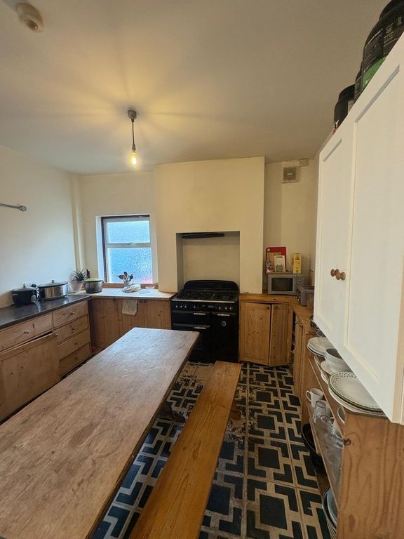Property photo 3 of 15 Spacious Kitchen With A Large Wooden Dining Area...