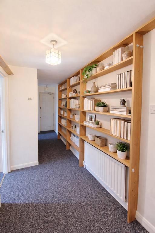 Property photo 2 of 14 Hallway With Styled Wooden Shelves