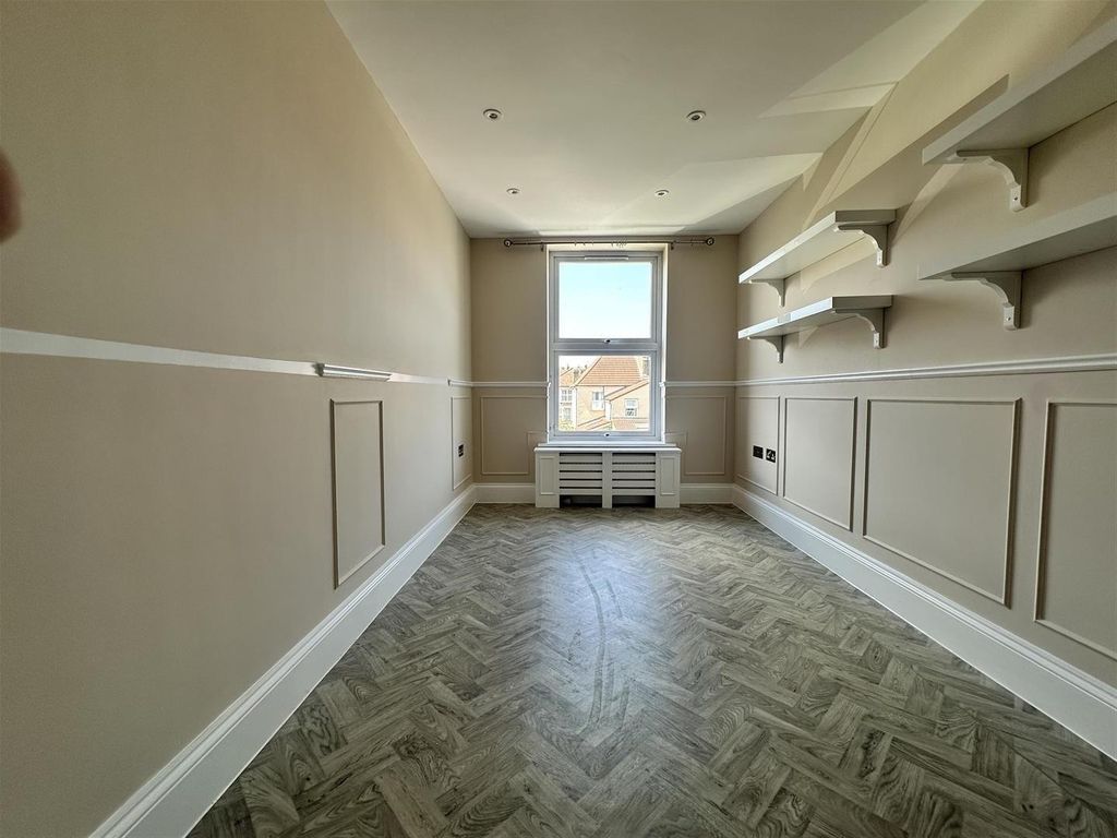 Property photo 3 of 7 Bright Workspace With Elegant Paneling And Shelves...