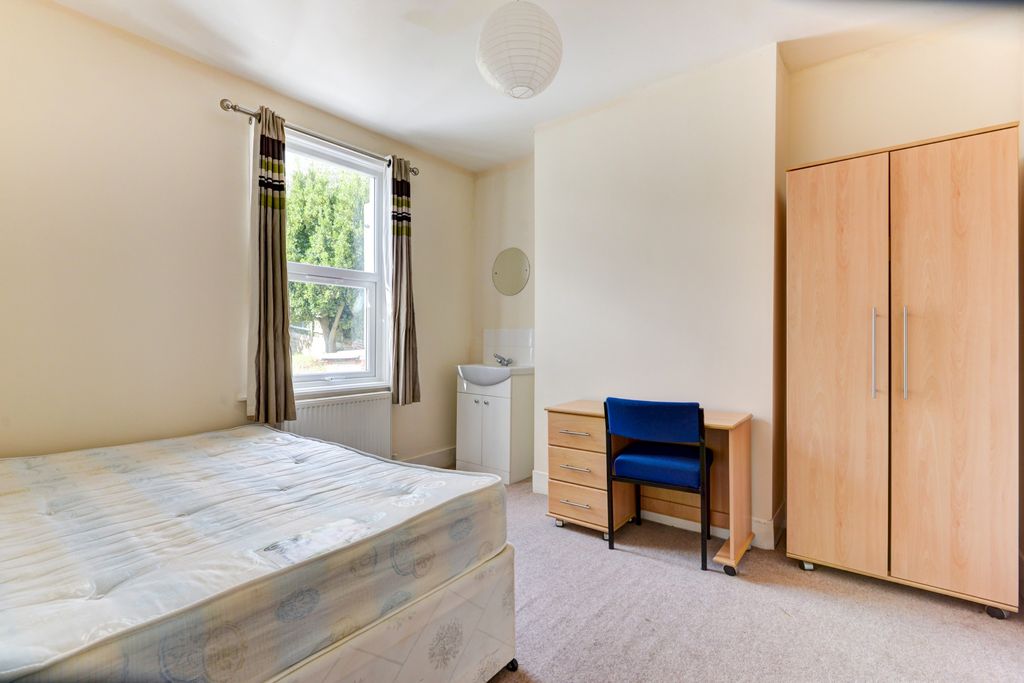 Property photo 1 of 20 Bright And Welcoming Master Bedroom Featuring A La...