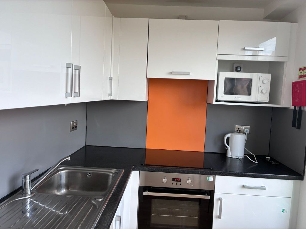 Property photo 2 of 6 Kitchen