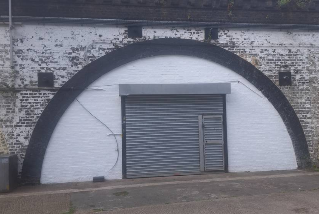 Property photo 2 of 2 Frontage With Roller Shutter Entrance