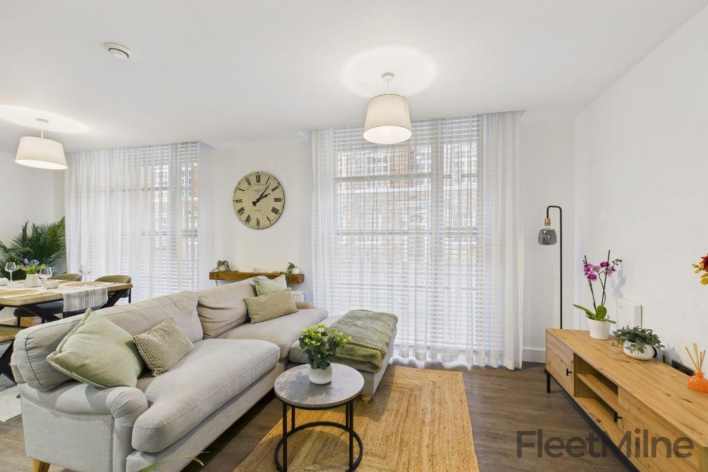 Property photo 2 of 17 Living Area