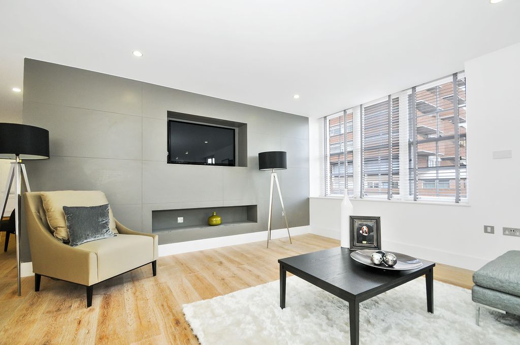 Property photo 3 of 8 TV Living Area