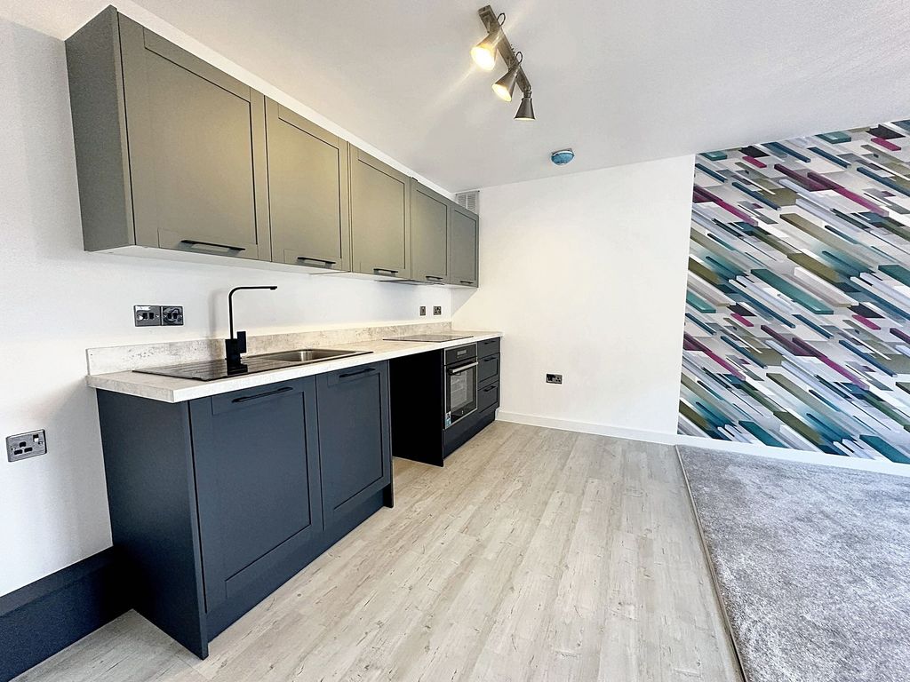 Property photo 3 of 8 Kitchen