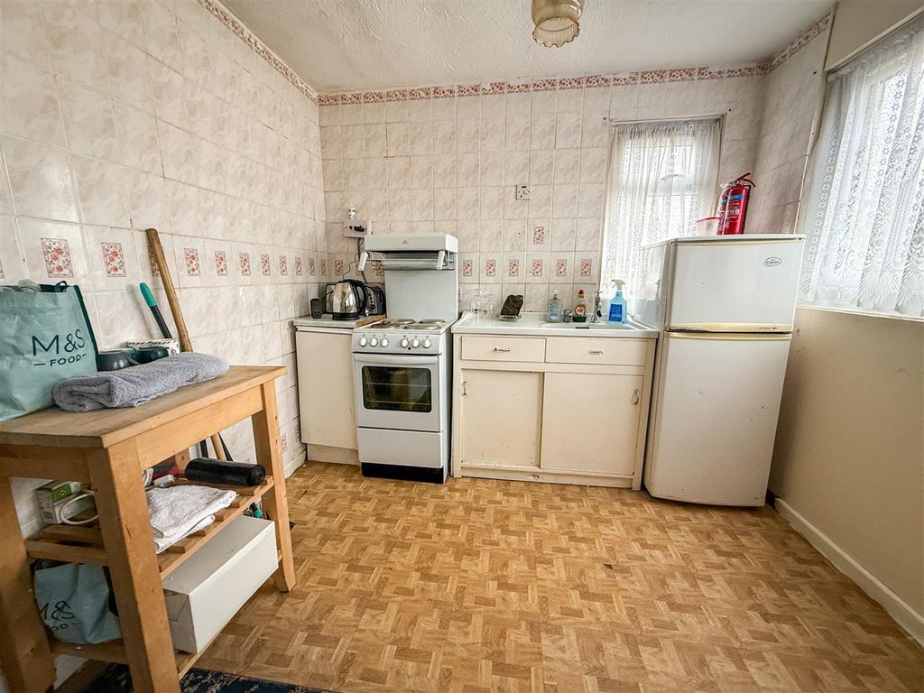 Property photo 3 of 12 Kitchen Area View