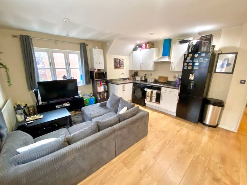 Property photo 2 of 8 Living Room And Kitchen