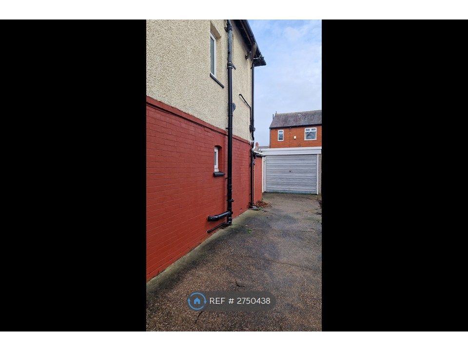 Property photo 2 of 13 Side View With Garage