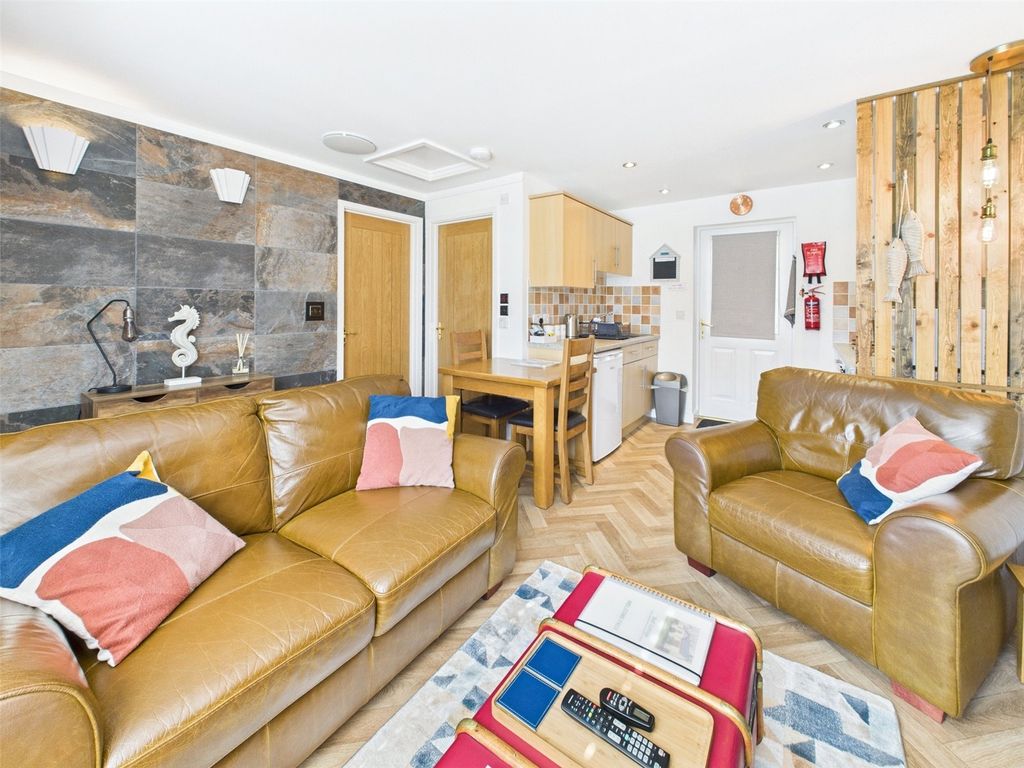 Property photo 2 of 16 Living Area