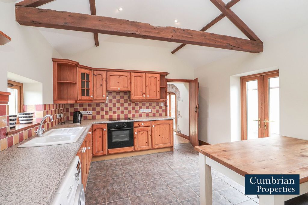 Property photo 2 of 15 Dining Kitchen