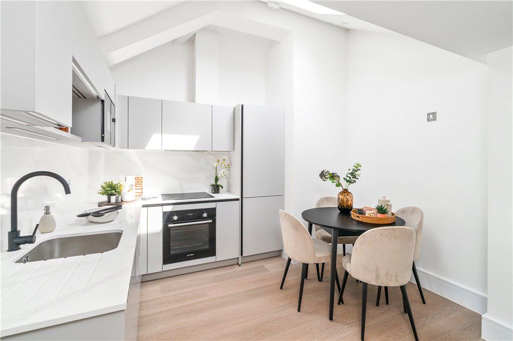Property photo 3 of 13 Dining Kitchen