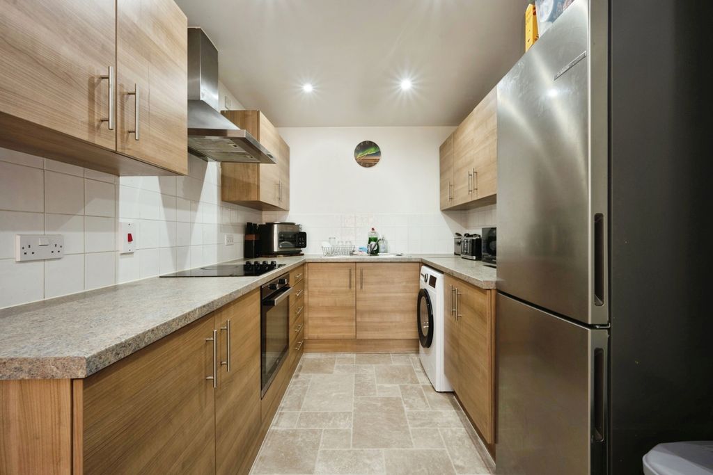 Property photo 2 of 9 Kitchen
