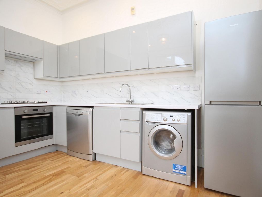 Property photo 2 of 9 Kitchen