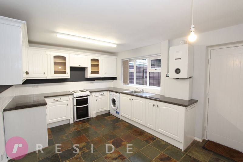 Property photo 3 of 13 Dining Kitchen