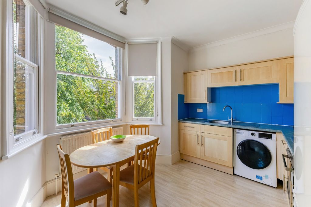 Property photo 3 of 8 Kitchen